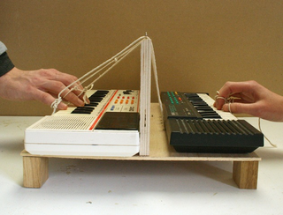 Illustration for article titled These Strange Experimental Instruments Are Played With a Partner